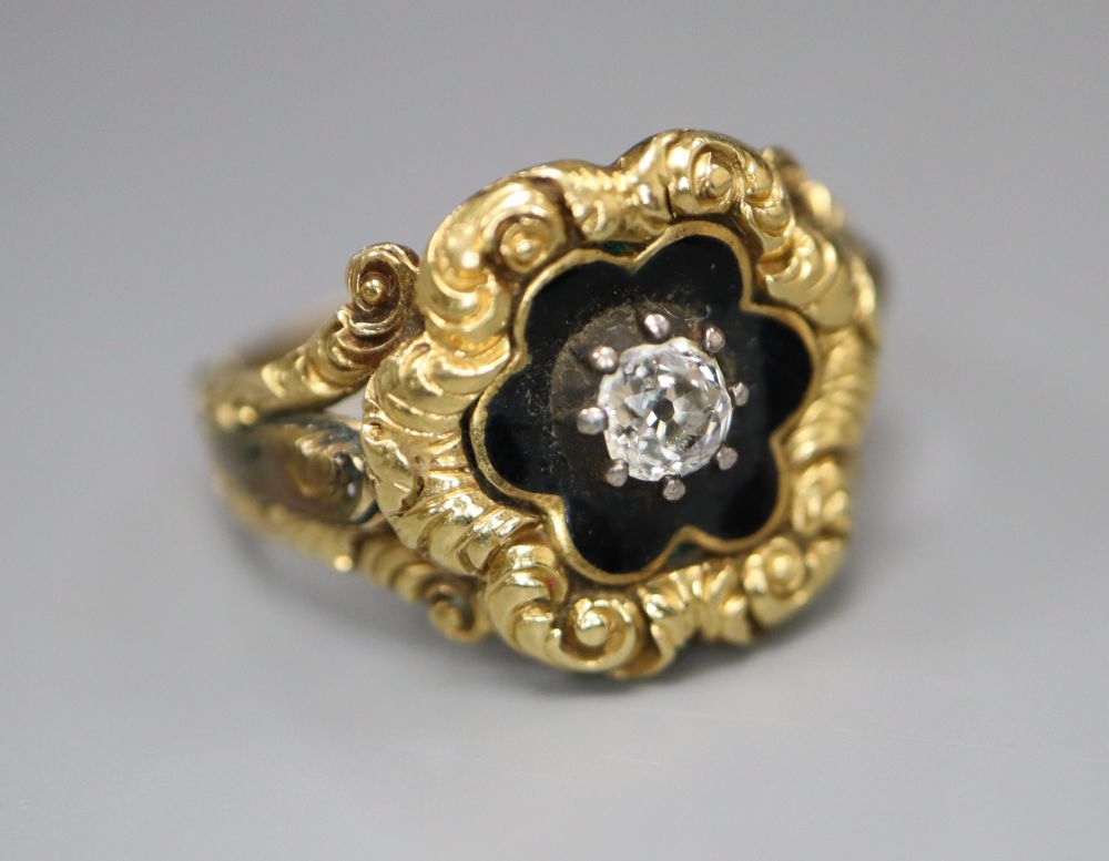 A William IV gold (tests as 14ct) and black enamel memorial ring set with a single diamond, size K/L, gross 3.6 grams,